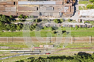 Aerial view of city industrial district. trains on railroad. drone image