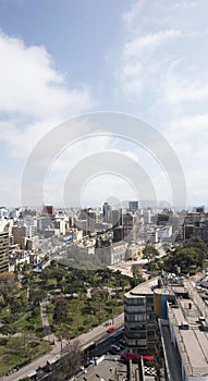 aerial view of the city with luxurious modern residential and office buildings square and cathedral- metropolis