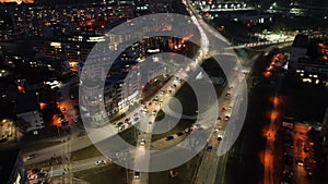 Aerial view of city at night. Street traffic of the city. Urban Landscape.