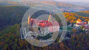 Aerial view of a city in Poland - north of the country - a castle in the middle of the forest - overlooking the trees and beautifu