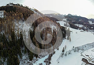 Aerial View of the City of Predazzo,Ã¬ covered by the Snow in December, in the North of Italy