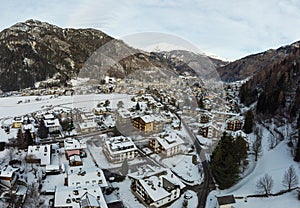 Aerial View of the City of Predazzo,Ã¬ covered by the Snow in December, in the North of Italy