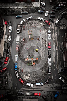 Aerial view of city yard with autos