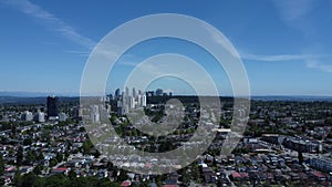 Aerial view of the cityscape with a blue cloudy sky in the background, Burnaby, Vancouver, Canada