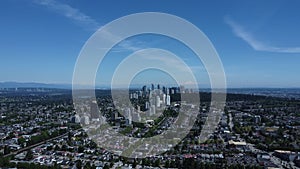 Aerial view of the cityscape with a blue cloudy sky in the background, Burnaby, Vancouver, Canada