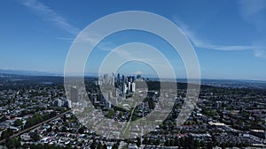 Aerial view of the cityscape with a blue cloudy sky in the background, Burnaby, Vancouver, Canada