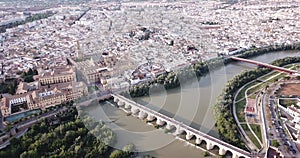 Aerial view of cityscape of Cordoba with Roman Bridge over the Guadalquivir and the Mosque-Cathedral of Cordoba