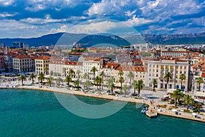 Aerial view of cityscape of Croatian city Split behind Riva promenade