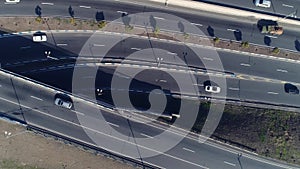 Aerial view of cityscape curve roads with cars