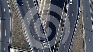 Aerial view of cityscape curve roads with cars