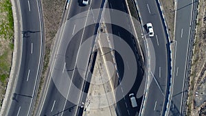 Aerial view of cityscape curve roads with cars