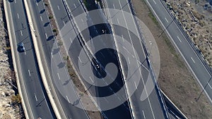 Aerial view of cityscape curve roads with cars