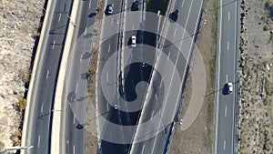 Aerial view of cityscape curve roads with cars