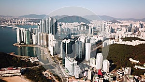 Aerial view of the cityscape in Haeundae, LCT and Haeundae beach in Busan.