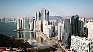 Aerial view of the cityscape in Haeundae, LCT and Haeundae beach in Busan.