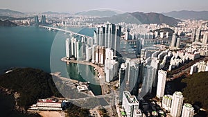 Aerial view of the cityscape in Haeundae, LCT and Haeundae beach in Busan.