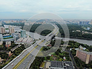 Aerial view cityscape of large streets. Car traffic on the highway in the big city.