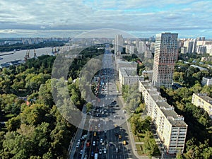 Aerial view cityscape of large streets. Car traffic on the highway in the big city.
