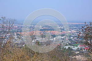 Aerial view cityscape looking from Nakhon Sawan Tower sits on top of Khiriwong Temple Hill