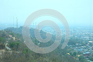 Aerial view cityscape looking from Nakhon Sawan Tower sits on top of Khiriwong Temple Hill