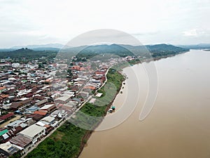 Aerial view of classic wooden house beside the Mekong river in Chiang Khan district, Loei