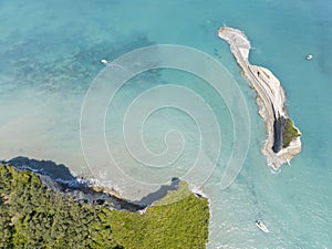 Aerial view of the cliff overlooking the sea near Apotripiti beach and of Mermaid`s rock. Corfu island. Greece