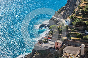 Aerial view of cliff with terrace by the sea and pathway on the hill, Riomaggiore ITALY