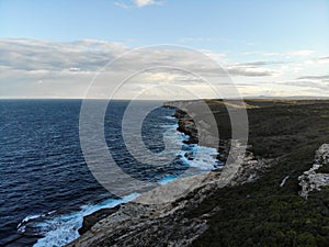 Aerial view of the cliff by the water