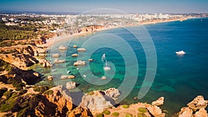 Aerial view of cliffs and beach Praia in Portimao, Algarve region, Portugal