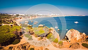 Aerial view of cliffs and beach Praia in Portimao, Algarve region, Portugal