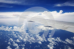 Aerial view of cloudy blue sky on sunny day