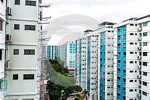 Aerial view, on a cloudy day, of Public Housing Apartments in Singapore. Also known as HDB, these are government built vertical