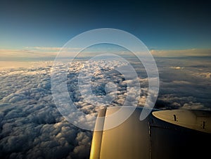 Aerial view of cloudy skies over England at sunrise. HDR effect.