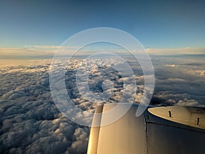 Aerial view of cloudy skies over England at sunrise. Subtle HDR effect.