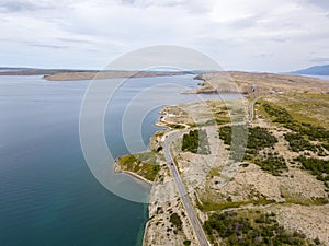 Aerial view of the coast of Croatia, winding roads and coves with crystal clear sea