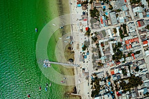 Aerial view of the coastline of the Isla Holbox Island on a bright sunny day