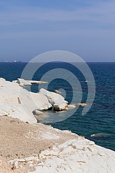 Aerial view of coastline and landmark big white chalk rock at Governor's beach,Limassol, Cyprus. Steep stone cliffs