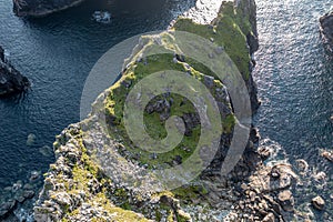 Aerial view of The Cobblers Tower at Glenlough bay between Port and Ardara in County Donegal - Ireland