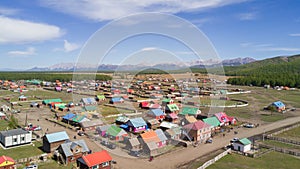 Aerial view of a colorful Mongolian village in the mountains.