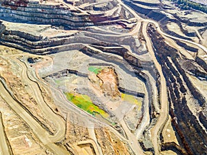 Aerial view of colorful, open pit mine