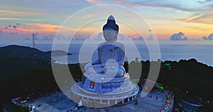 aerial view colorful pink cloud in blue sky at sunrise or sunset at Phuket big Buddha.