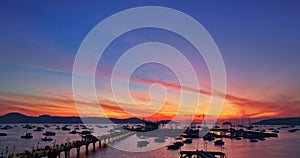 .aerial view colorful sunrise above Chalong pier.