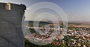 Aerial view of colossal monument 1300 years Founders of the Bulgarian State in Shumen, Bulgaria, aerial panorama view city