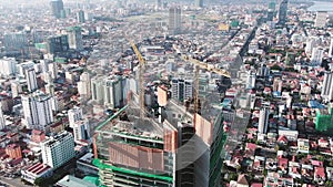 Aerial view of a combined residential and office tower under construction in Asia