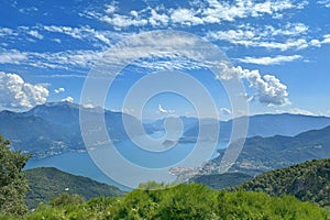 aerial view of Como Lake landscape in beautiful summer day, trees, water and mountains, Italy, Europe, concept romantic vacation