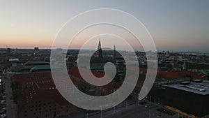 Aerial view of complex of buildings around Christiansborg palace at dusk. Panoramic view of evening city. Copenhagen