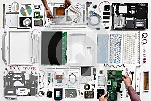 An aerial view of computer parts on white background