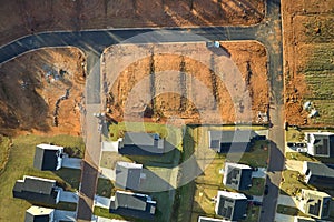Aerial view of construction site with new tightly packed homes in South Carolina. Family houses as example of real