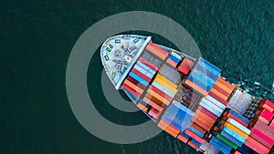 Aerial view container cargo ship, business freight shipping international by container cargo ship in the open sea.