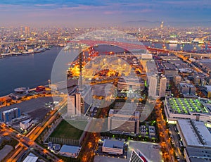 Aerial view of container cargo ship in the export and import business and logistics international goods in urban city. Shipping to